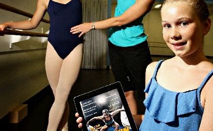 Britney Reece, 12, is looking forward to the new dance app while Karen Manley gives Brooke Nolan, 12, some pointers. Britney Reece, 12, is looking forward to the new dance app while Karen Manley gives Brooke Nolan, 12, some pointers.