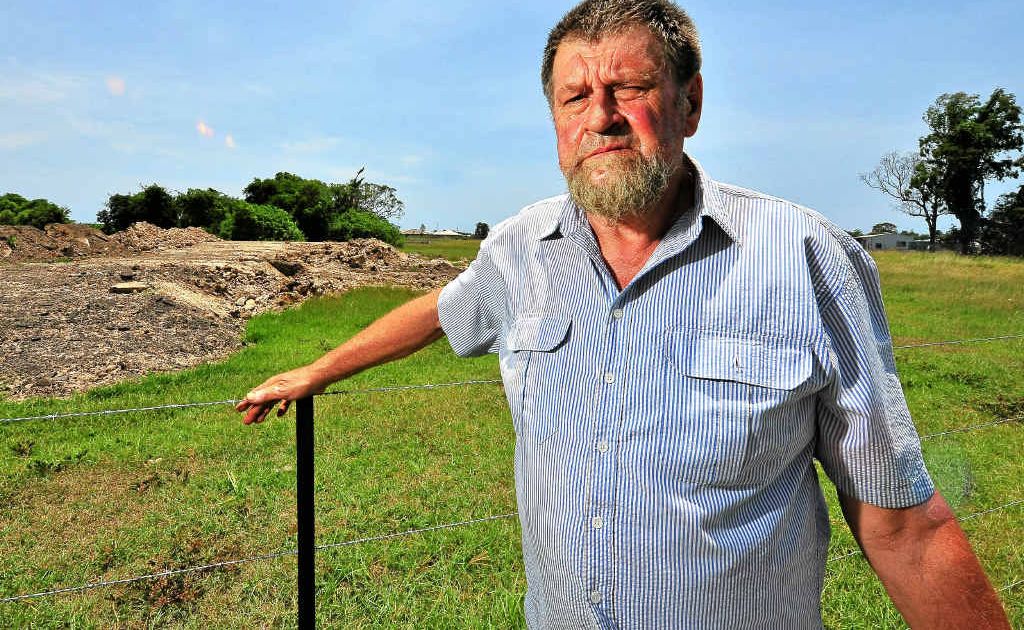 East Bundaberg man Bernie McGarry has grave concerns about flooding after Bundaberg Regional Council started building up the land opposite his home. East Bundaberg man Bernie McGarry has grave concerns about flooding after Bundaberg Regional Council started building up the land opposite his home.