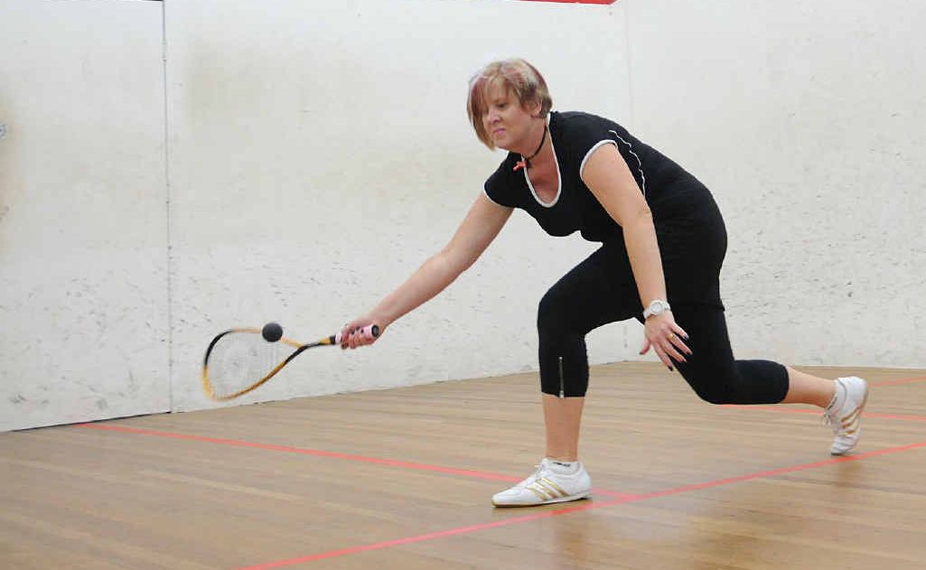 Gympie Squash Court owner Susan Kerr in action at her Cartwright Rd courts. Gympie Squash Court owner Susan Kerr in action at her Cartwright Rd courts.