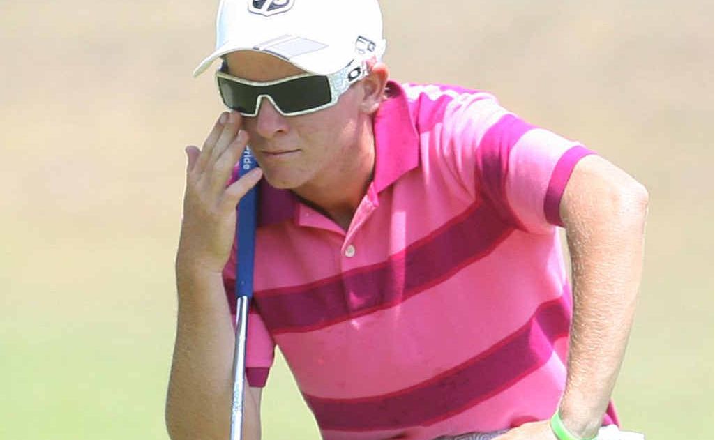 Yeppoon’s Matt Lacey is deep in thought as he studies the green before putting at the Junior Classic at Capricorn Resort. Yeppoon’s Matt Lacey is deep in thought as he studies the green before putting at the Junior Classic at Capricorn Resort.