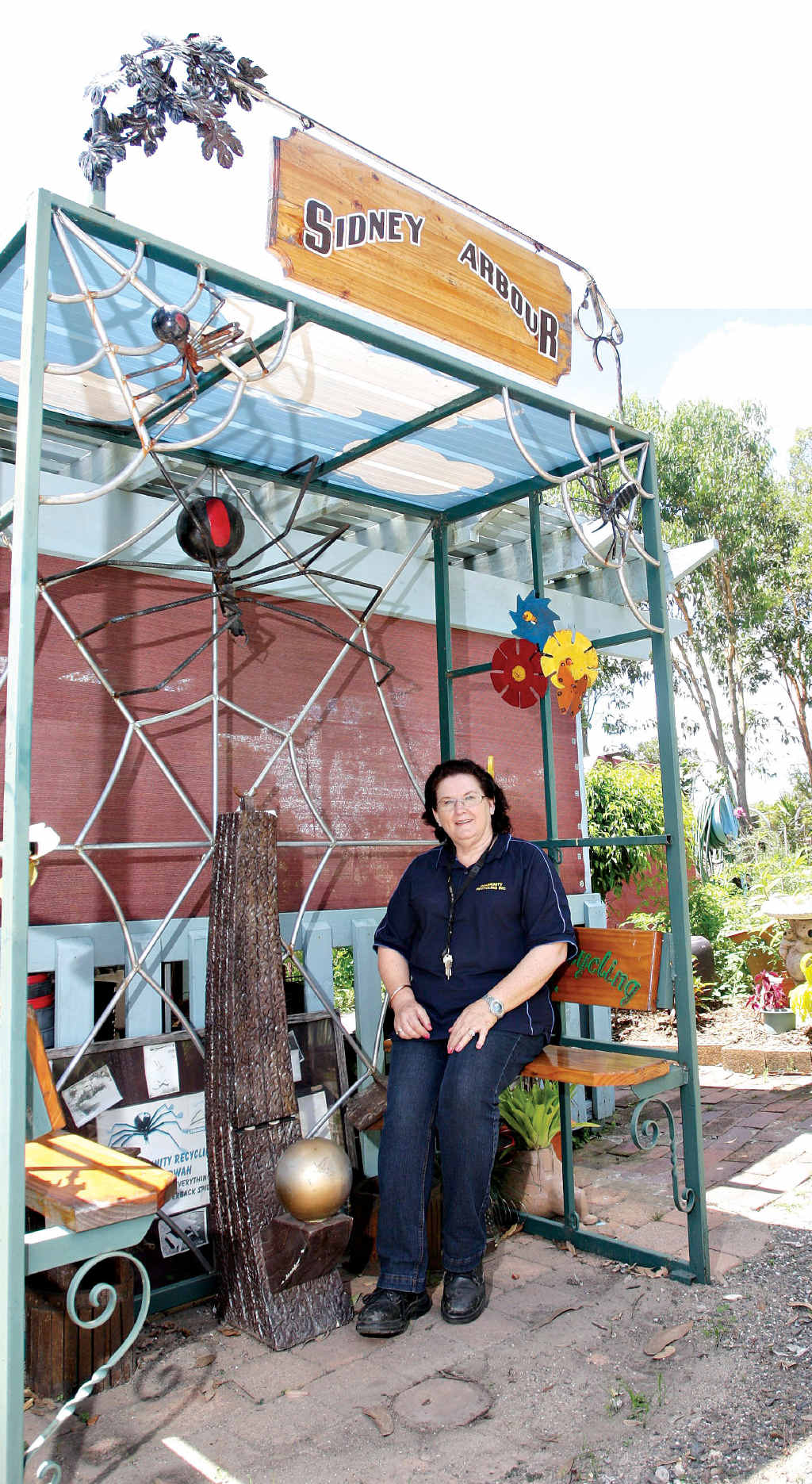 Beerwah Recycling Market manager Trish Cashin takes a break in the Recycled Garden. Beerwah Recycling Market manager Trish Cashin takes a break in the Recycled Garden.