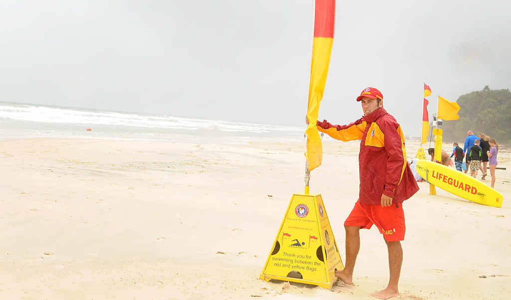 Lifeguard Sam Murray surveys the blustery and potentially dangerous conditions at Rainbow Beach yesterday. Lifeguard Sam Murray surveys the blustery and potentially dangerous conditions at Rainbow Beach yesterday.
