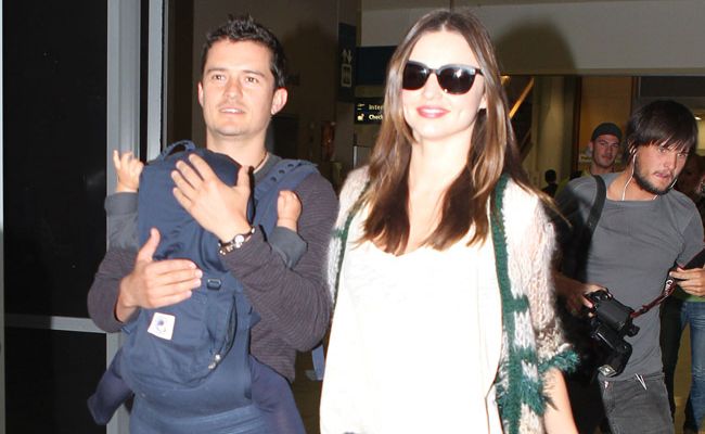 Miranda Kerr and Orlando Bloom with son Flynn. Miranda Kerr and Orlando Bloom with son Flynn.
