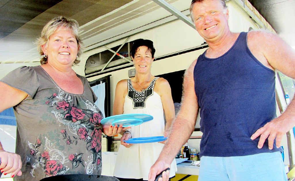 Annual visitors Melinda and David Cooper and Kelley Jennings (centre) say caravan parks must stay. Annual visitors Melinda and David Cooper and Kelley Jennings (centre) say caravan parks must stay.