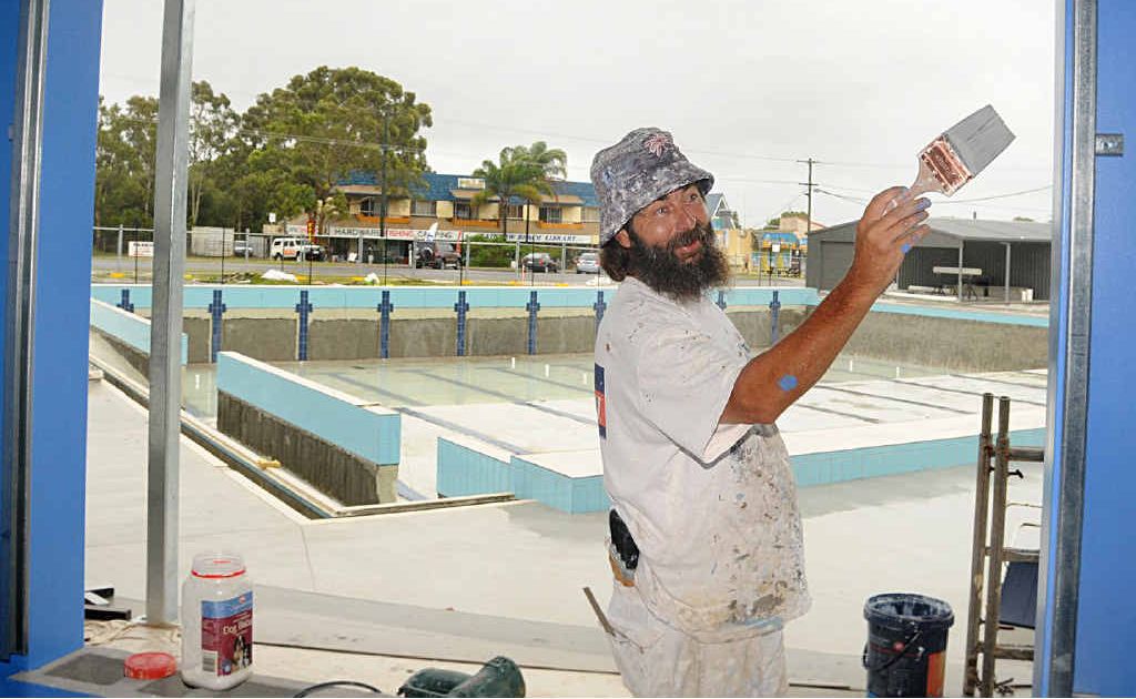 Steve Allen’s efforts (above) are part of the big finishing-off stages of the new Rainbow Beach aquatic centre, now only about two months from opening. Steve Allen’s efforts (above) are part of the big finishing-off stages of the new Rainbow Beach aquatic centre, now only about two months from opening.