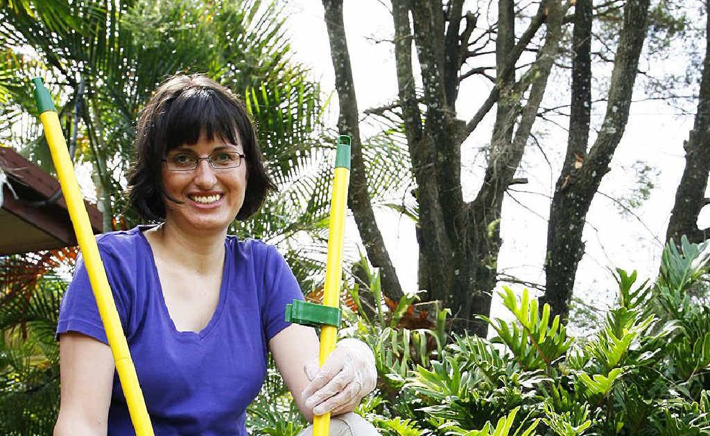 Miranda Flemming, with her dog Bailey, offers a pet poop collection service. Miranda Flemming, with her dog Bailey, offers a pet poop collection service.