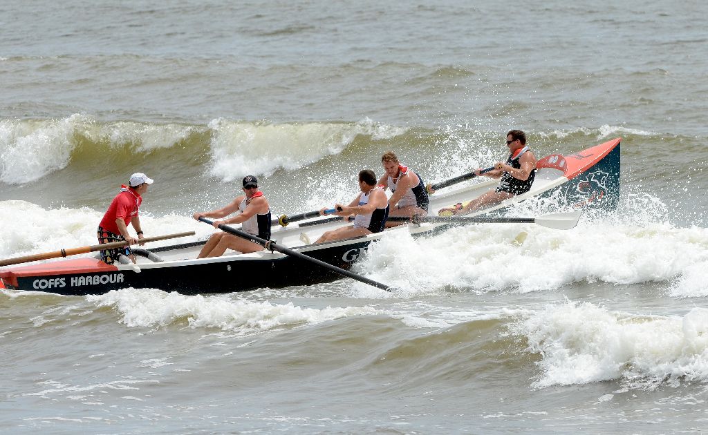 The Coffs Harbour Surfboat Team battle the swell at the Woolgoolga Surfboat Carnival. The Coffs Harbour Surfboat Team battle the swell at the Woolgoolga Surfboat Carnival.