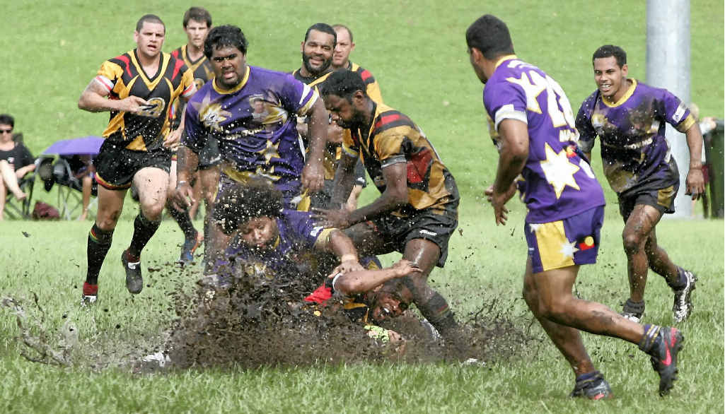 Players put together a great show despite the muddy conditions for the Shield final between Ian Munns Memorial and Bundaberg Eels. Players put together a great show despite the muddy conditions for the Shield final between Ian Munns Memorial and Bundaberg Eels.