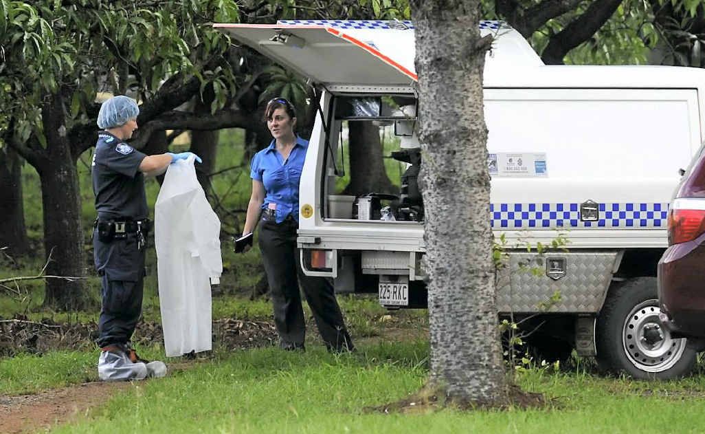 Police detectives and forensic staff prepare to enter the house to investigate the stabbing. Police detectives and forensic staff prepare to enter the house to investigate the stabbing.