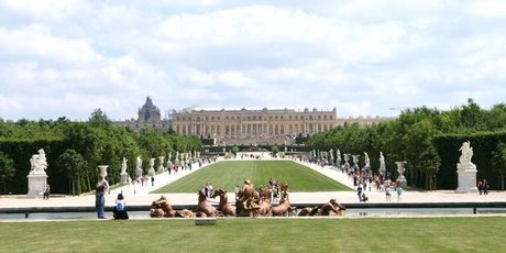 Apollo Fountain - with no water - in the foreground, with the Palace of Versailles in the distance. Apollo Fountain - with no water - in the foreground, with the Palace of Versailles in the distance.
