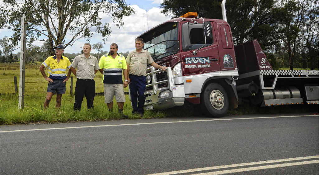 Maclean Towing’s Mick Bennett, Raven Smash Repairs office manager Ed Bennett, tow truck driver Corey Fuller and Raven’s owner Mick Howell are calling for better use of technology to help prevent motorists needing rescue on the Pacific Hwy. Maclean Towing’s Mick Bennett, Raven Smash Repairs office manager Ed Bennett, tow truck driver Corey Fuller and Raven’s owner Mick Howell are calling for better use of technology to help prevent motorists needing rescue on the Pacific Hwy.