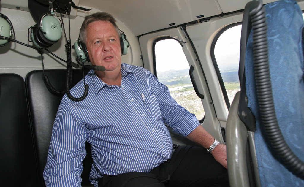Rockhampton Mayor Brad Carter, pictured taking an aerial view of the impact of the Fitzroy River flood on Rockhampton last year, is urging voters not to believe false promises. Rockhampton Mayor Brad Carter, pictured taking an aerial view of the impact of the Fitzroy River flood on Rockhampton last year, is urging voters not to believe false promises.