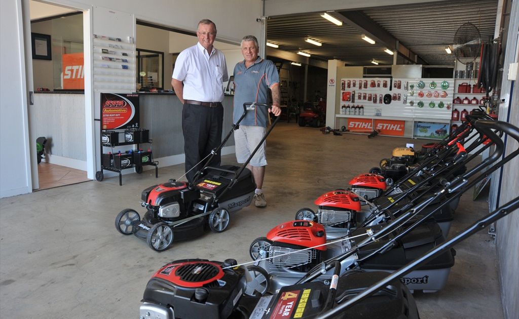 Pacific Mowers owner Kevin Kerr, right, with his business mentor Grahame Milton. Pacific Mowers owner Kevin Kerr, right, with his business mentor Grahame Milton.