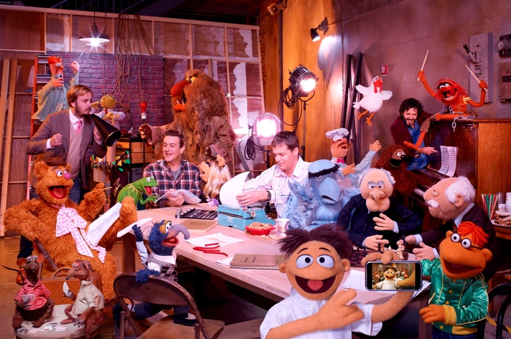The Muppets cast doing a read-through. Pictured, from left, are James Bobin, Jason Segel, Nick Stoller and Bret McKenzie.