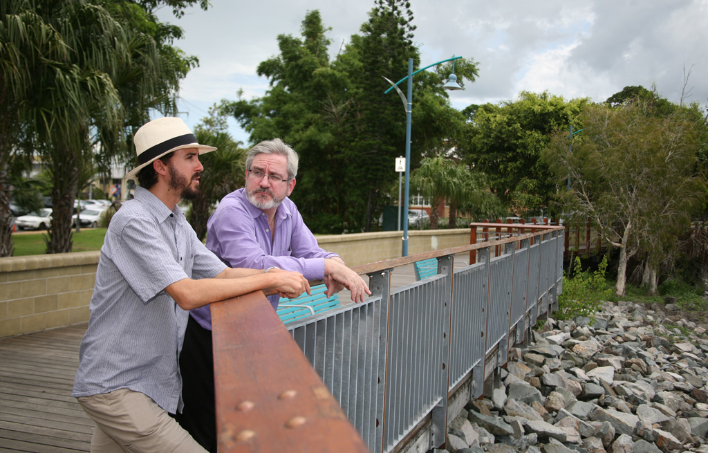 Queensland Greens convenor Andrew Bartlett, right, chats to Whitsunday candidate Jonathon Dkykj.