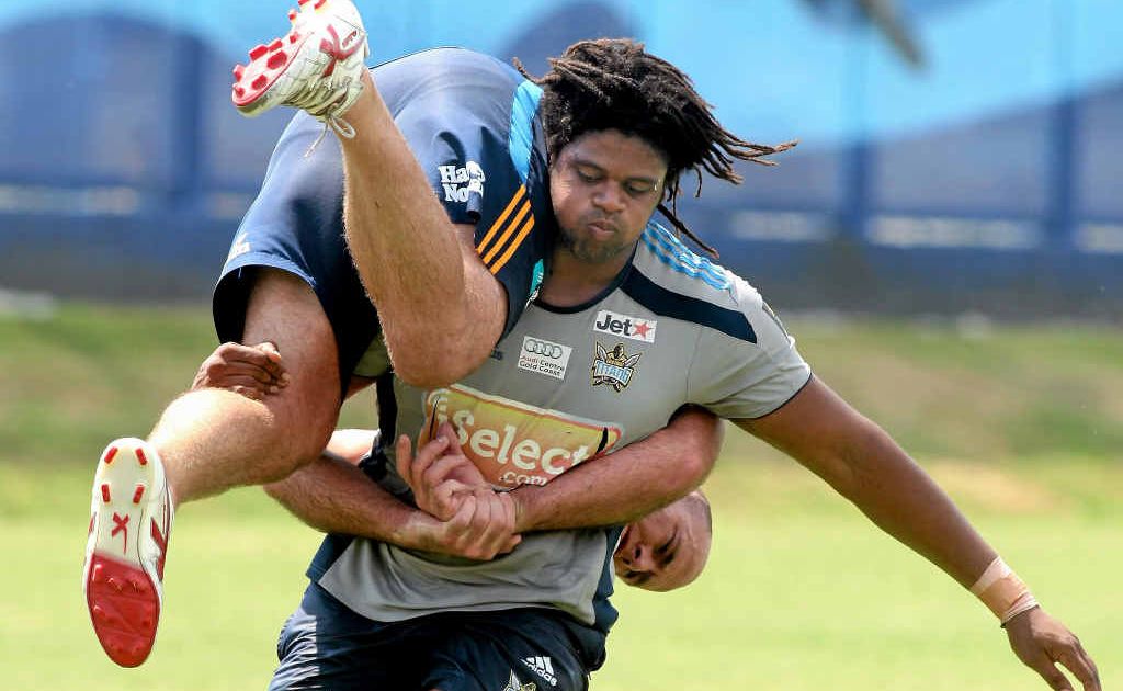 Gold Coast recruit Jamal Idris picks up fellow Titan Matt White. Mackay fans hope that Idris will take on the Cowboys this weekend after making his first appearance for the Titans. Gold Coast recruit Jamal Idris picks up fellow Titan Matt White. Mackay fans hope that Idris will take on the Cowboys this weekend after making his first appearance for the Titans.