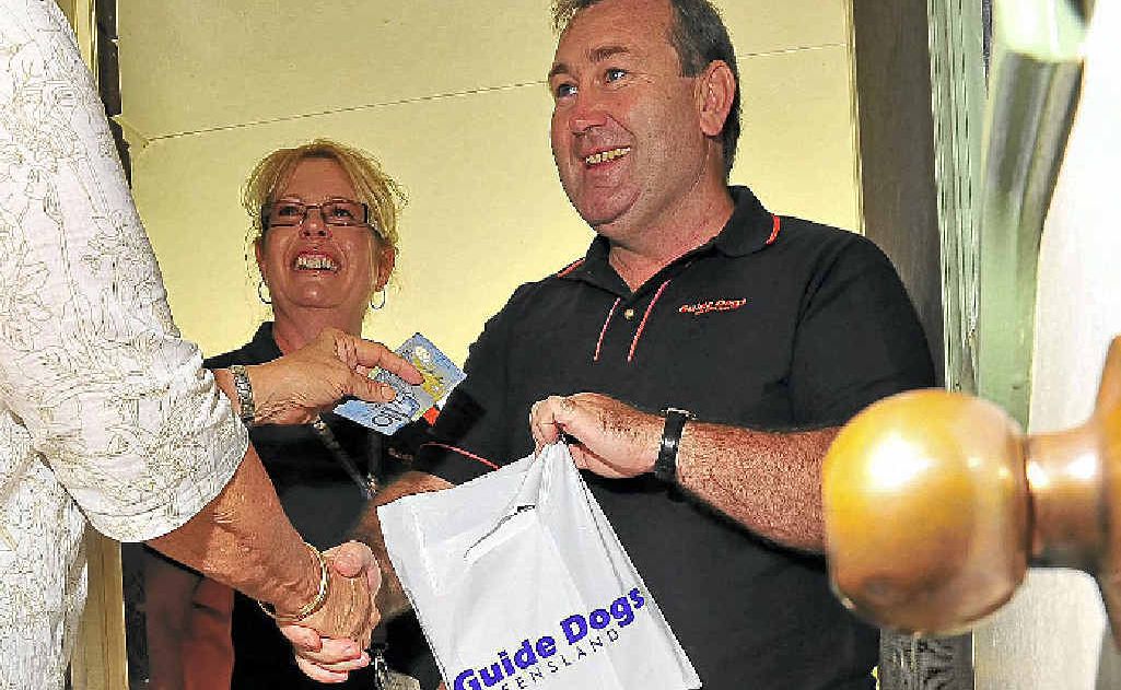 Member for Bundaberg Jack Dempsey and Guide Dogs community relations officer Nerida Hepple launch the Paw Knock Appeal with Tompson the dog. Member for Bundaberg Jack Dempsey and Guide Dogs community relations officer Nerida Hepple launch the Paw Knock Appeal with Tompson the dog.