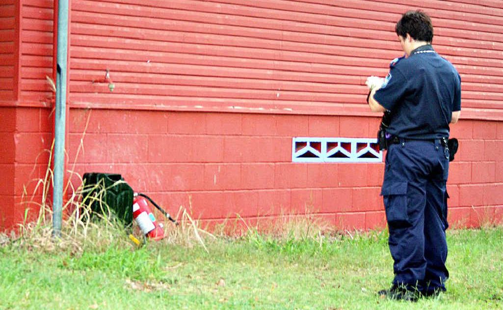 A police officer at the Moura Memorial Club late yesterday afternoon. A police officer at the Moura Memorial Club late yesterday afternoon.