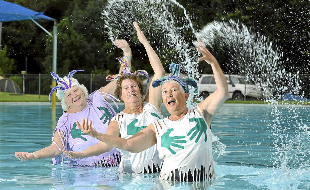 The Magnificent Mammary Mermaids Synchronised Swimming team, Sue Edmonds, Pauline Ahern, Denise Braidwood, practising at the Nimbin Pool for the ‘Olympics’. The Magnificent Mammary Mermaids Synchronised Swimming team, Sue Edmonds, Pauline Ahern, Denise Braidwood, practising at the Nimbin Pool for the ‘Olympics’.