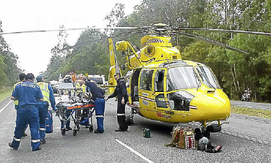 The Westpac Life Saver Rescue Helicopter and paramedics tend to the victim of a serious car crash on the Pacific Highway north of Maclean in September. The Westpac Life Saver Rescue Helicopter and paramedics tend to the victim of a serious car crash on the Pacific Highway north of Maclean in September.