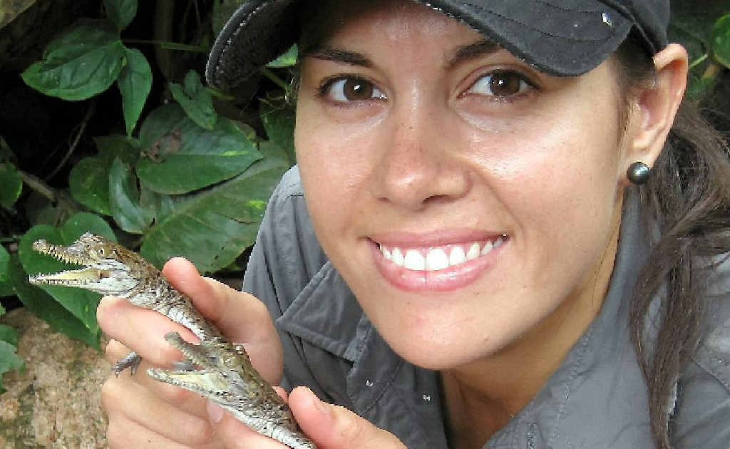 Cooberrie Park wildlife keeper Frances Carnahan holds two baby freshwater crocodiles.