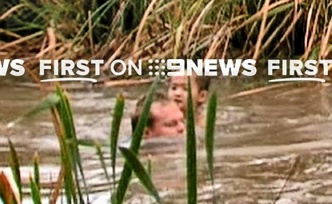 Nine Network cameraman and former Rockhampton man Glenn Edwards rescues missing Vietnamese boy Ryan Pham from a swollen Kororoit Creek after heavy rainfall yesterday. Nine Network cameraman and former Rockhampton man Glenn Edwards rescues missing Vietnamese boy Ryan Pham from a swollen Kororoit Creek after heavy rainfall yesterday.