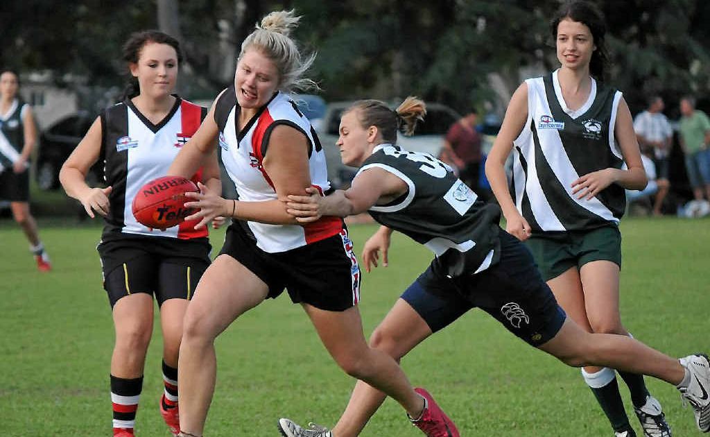 BITS’ Hayley Beaumont and Gladstone Mudcrabs player Sheila Daly in action during the women’s match on Saturday at BITS Oval, Jacaranda Drive, Boyne Island. BITS’ Hayley Beaumont and Gladstone Mudcrabs player Sheila Daly in action during the women’s match on Saturday at BITS Oval, Jacaranda Drive, Boyne Island.