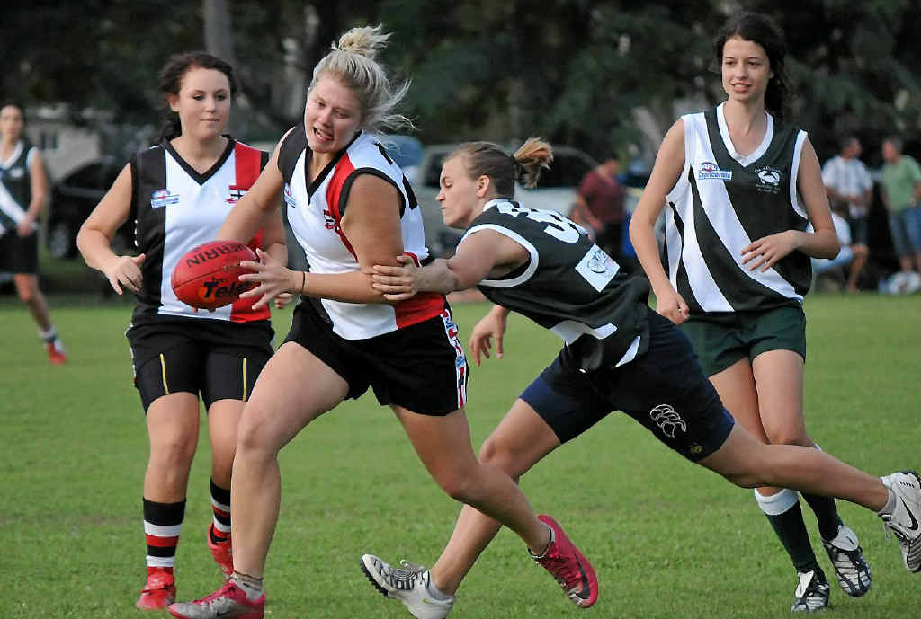 BITS’ Hayley Beaumont and Gladstone Mudcrabs player Sheila Daly in action during the women’s match on Saturday at BITS Oval, Jacaranda Drive, Boyne Island. BITS’ Hayley Beaumont and Gladstone Mudcrabs player Sheila Daly in action during the women’s match on Saturday at BITS Oval, Jacaranda Drive, Boyne Island.