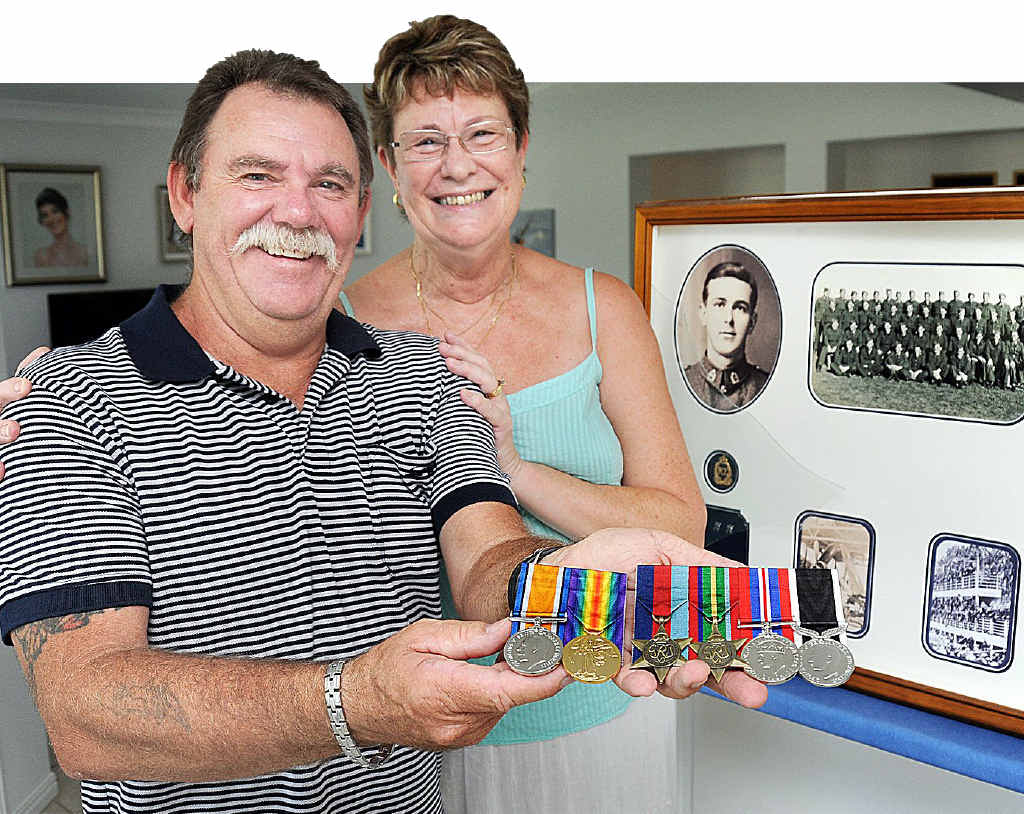 Peter Crane (medal mounter) presented Laraine O’Leary with replica war medals after hers were stolen two weeks ago.