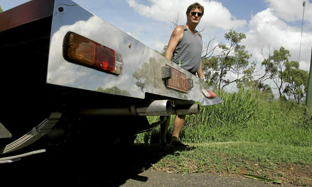 Mark Simpson with his Holden HQ ute which thieves tried to steal, before driving it off a retaining wall at his Koongal home. Mark Simpson with his Holden HQ ute which thieves tried to steal, before driving it off a retaining wall at his Koongal home.