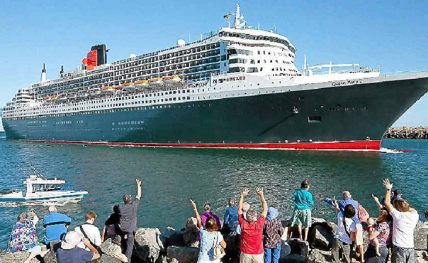 ATTENTION SEEKER: The Queen Mary 2 is the talk of the town with people clambering for a vantage point to see her regal beauty. ATTENTION SEEKER: The Queen Mary 2 is the talk of the town with people clambering for a vantage point to see her regal beauty.