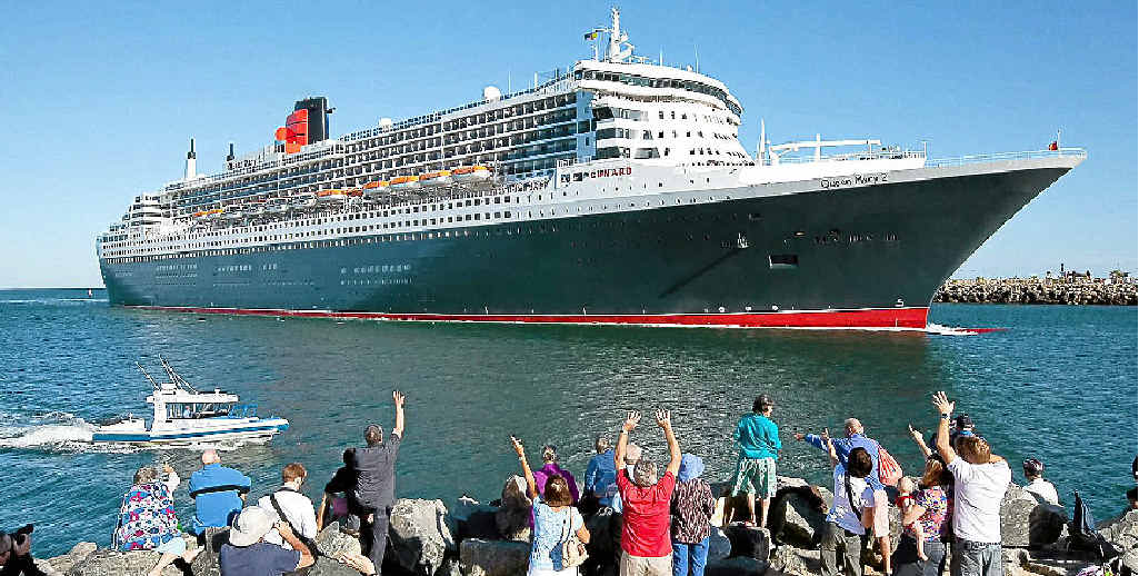 ATTENTION SEEKER: The Queen Mary 2 is the talk of the town with people clambering for a vantage point to see her regal beauty. ATTENTION SEEKER: The Queen Mary 2 is the talk of the town with people clambering for a vantage point to see her regal beauty.