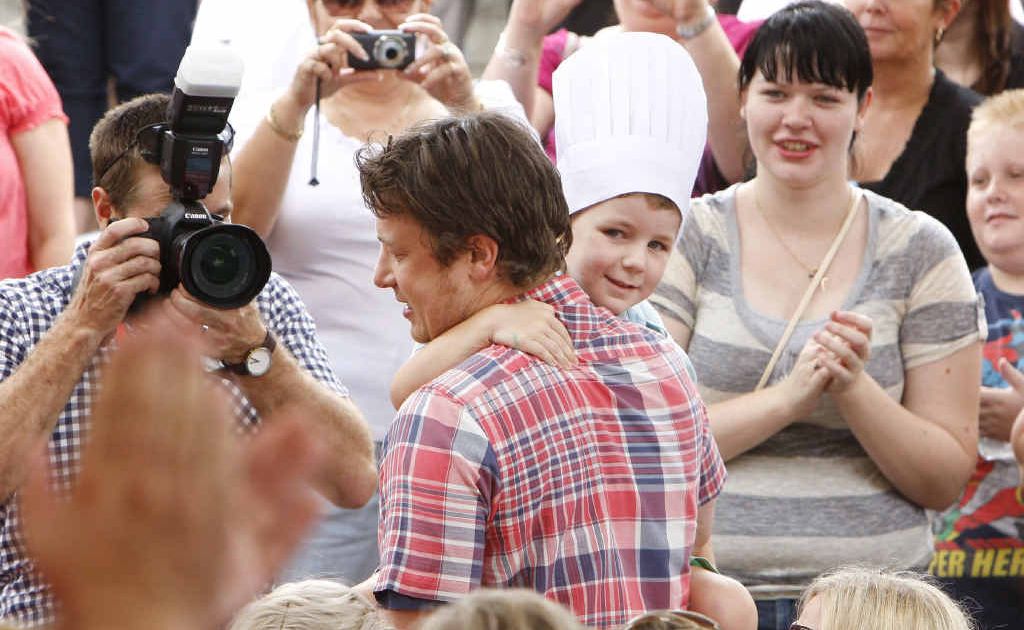 Celebrity chef Jamie Oliver picks Aston Wright from the crowd for his cooking demonstration on Saturday. Celebrity chef Jamie Oliver picks Aston Wright from the crowd for his cooking demonstration on Saturday.
