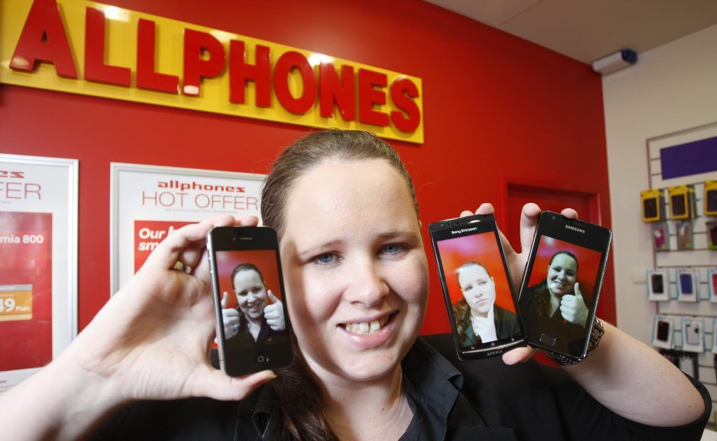 Employee of Allphones Riverlink Jennifer Spence with the 3 most popular smart phones, the iPhone, Samsung and Sony Ericsson Arc. Employee of Allphones Riverlink Jennifer Spence with the 3 most popular smart phones, the iPhone, Samsung and Sony Ericsson Arc.