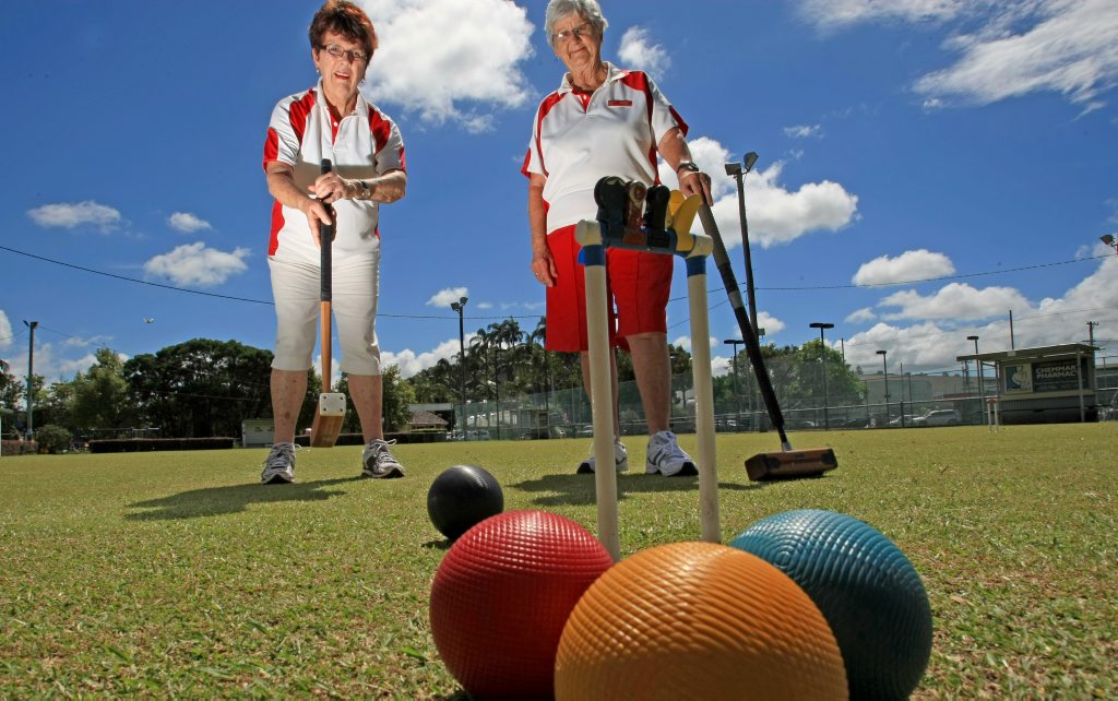 Joy Hughes and Marg Mitchell have a game of croquet at Murwillumbah Croquet Club.