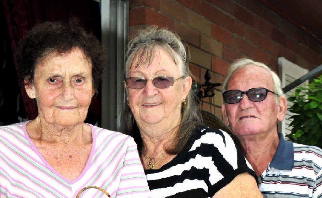 Avis Jones with Muriel and Bill Smith outside their South Mackay units. Avis Jones with Muriel and Bill Smith outside their South Mackay units.