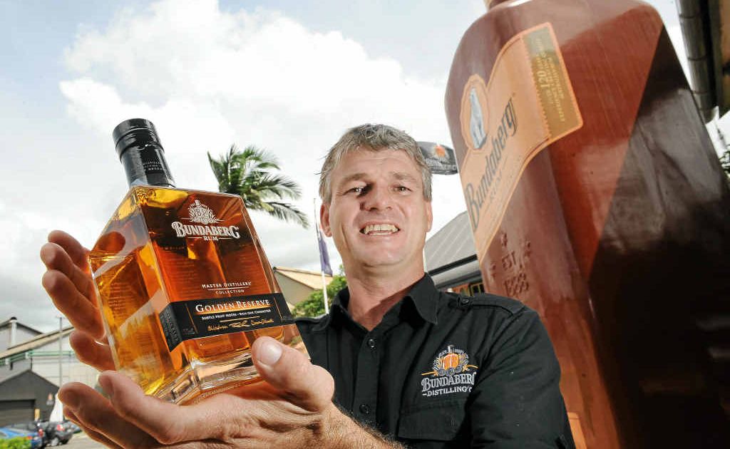 Bundaberg rum bond store manager Hayden Jobson with the latest bottle of rum. Bundaberg rum bond store manager Hayden Jobson with the latest bottle of rum.