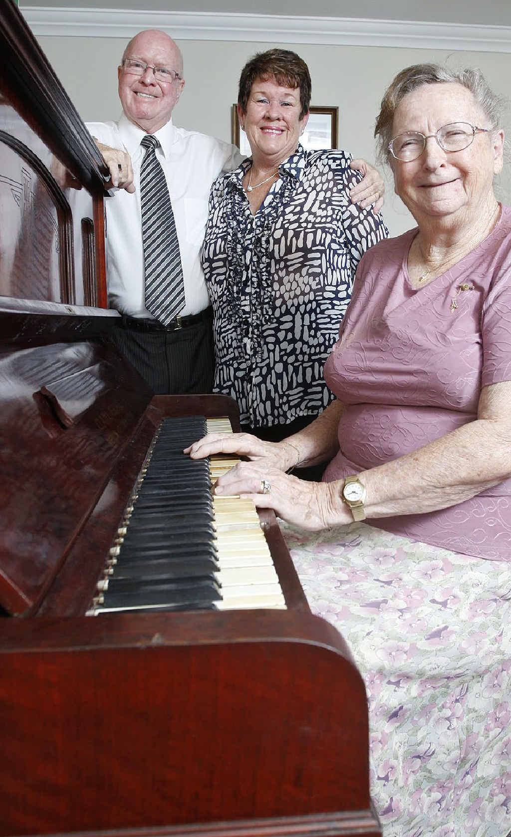 Resident of Oxford Crest Bundamba Betty McCrindle playing Amazing Grace on the 100-year-old piano. Resident of Oxford Crest Bundamba Betty McCrindle playing Amazing Grace on the 100-year-old piano.