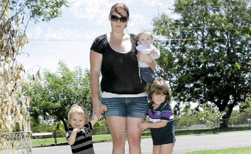 Katie Madigan with her children Maverick, Ava and Holly, recovering after a car fire in her driveway in Dean St, North Rockhampton. Katie Madigan with her children Maverick, Ava and Holly, recovering after a car fire in her driveway in Dean St, North Rockhampton.