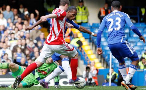 Didier Drogba got the decisive goal as Chelsea beat 10-man Stoke at Stamford Bridge. Didier Drogba got the decisive goal as Chelsea beat 10-man Stoke at Stamford Bridge.