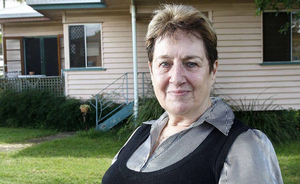 STAYING PUT: North Booval resident Sheila Smith outside her home which didn’t flood in January 2011. Sheila isn’t worried about the price drop in houses in the area. Photo: Sarah Harvey STAYING PUT: North Booval resident Sheila Smith outside her home which didn’t flood in January 2011. Sheila isn’t worried about the price drop in houses in the area. Photo: Sarah Harvey