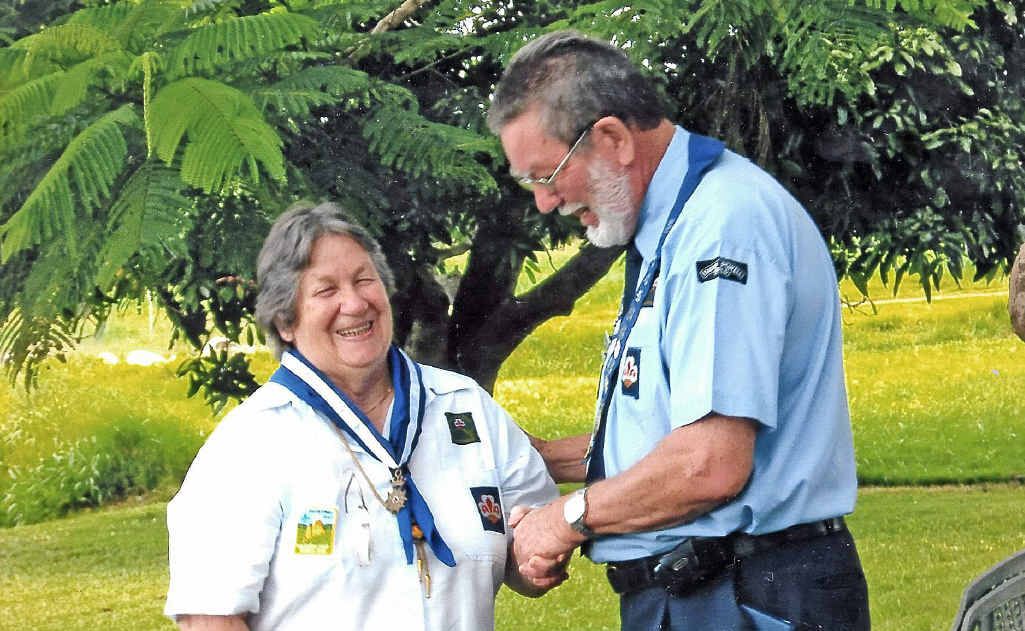 HONOURED: Margaret Kohlmetz receives her award from State Master of the Baden Powell Guild, Keith Parry. HONOURED: Margaret Kohlmetz receives her award from State Master of the Baden Powell Guild, Keith Parry.