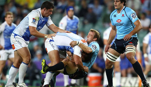 Sarel Pretorius is sent backwards by the Force defence Sarel Pretorius is sent backwards by the Force defence