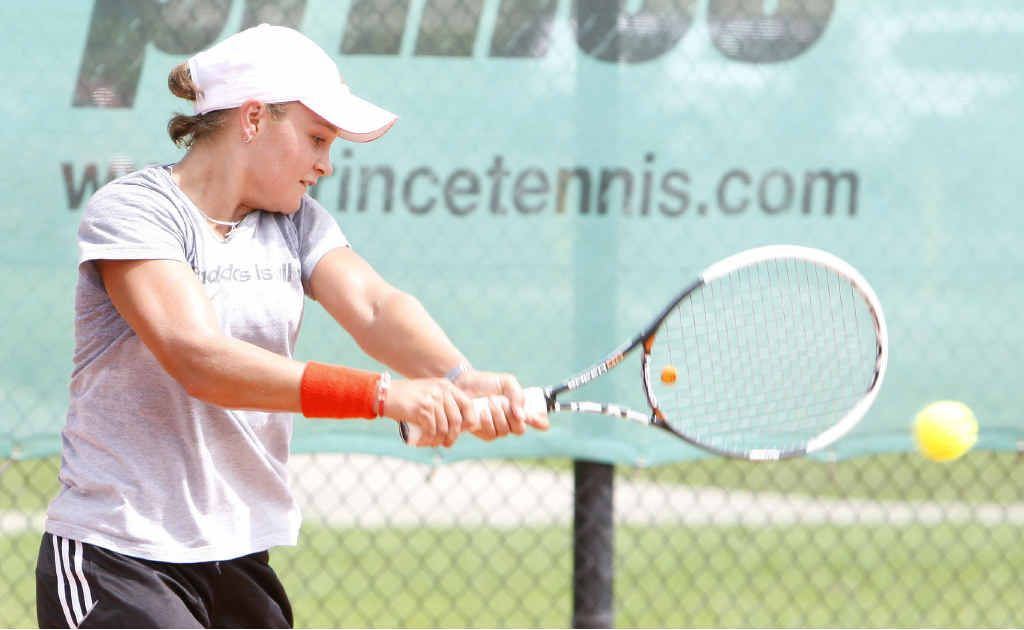 Ipswich tennis star Ashleigh Barty warms up at Leichhardt yesterday in readiness for her first match today. Ipswich tennis star Ashleigh Barty warms up at Leichhardt yesterday in readiness for her first match today.