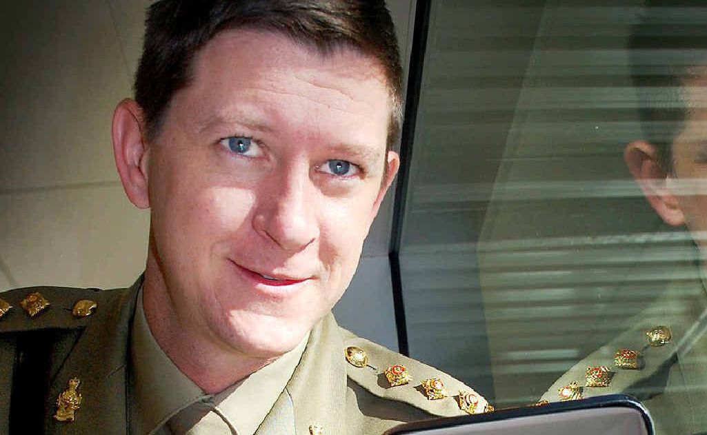 Bernard Gaynor, Katter’s Australian Party candidate for Bundamba, is seen receiving the US Meritorious Service Medal.