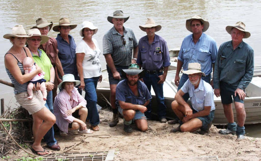 Some of the people who are cut off by the swollen Fitzroy River north of Gogango. Some of the people who are cut off by the swollen Fitzroy River north of Gogango.