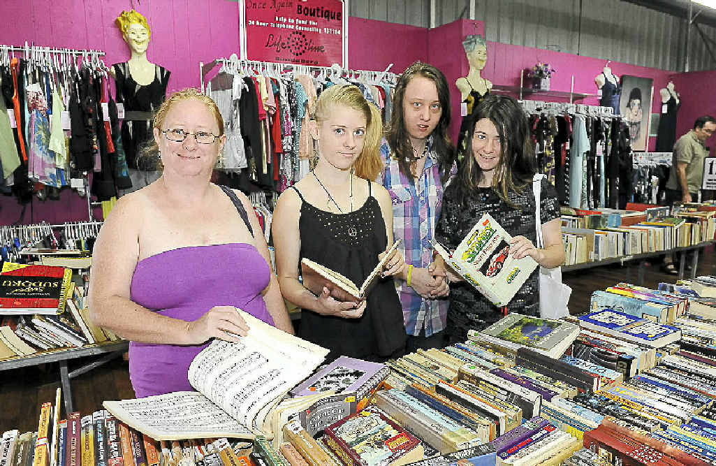 Tammy Walker, Margie Walker, Lee Bunny and Vanessa Walker look through the huge selection of books available at the Lifeline Monster Bookfest.