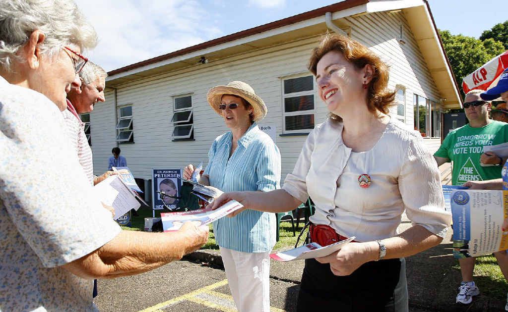 Rachel Nolan (ALP) hands out how-to-vote cards at Trinity Uniting Church Hall in North Booval on Saturday. Rachel Nolan (ALP) hands out how-to-vote cards at Trinity Uniting Church Hall in North Booval on Saturday.