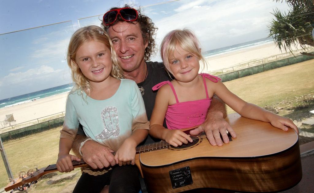 Brian Burdett and his daughters. Brian Burdett and his daughters.