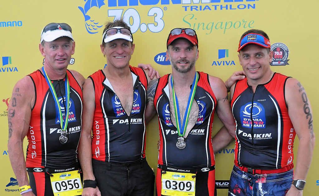 Mackay men (from left) Matt Perkins, Russell O’Hara, Neil Rissman and Brendan Camilleri after competing in the Singapore 70.3 triathlon. Mackay men (from left) Matt Perkins, Russell O’Hara, Neil Rissman and Brendan Camilleri after competing in the Singapore 70.3 triathlon.